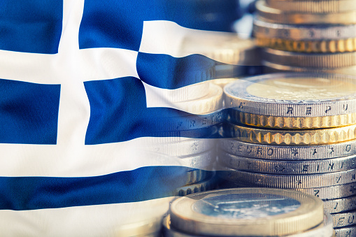 Handelsblatt: Σημαντική μείωση του χρέους στην Ελλάδα